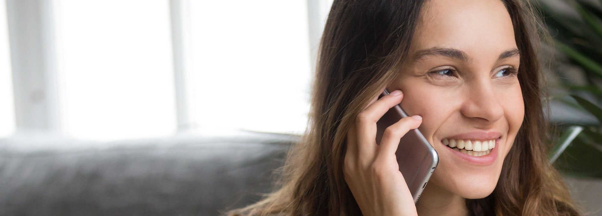 Young Adult Women speaking on the phone