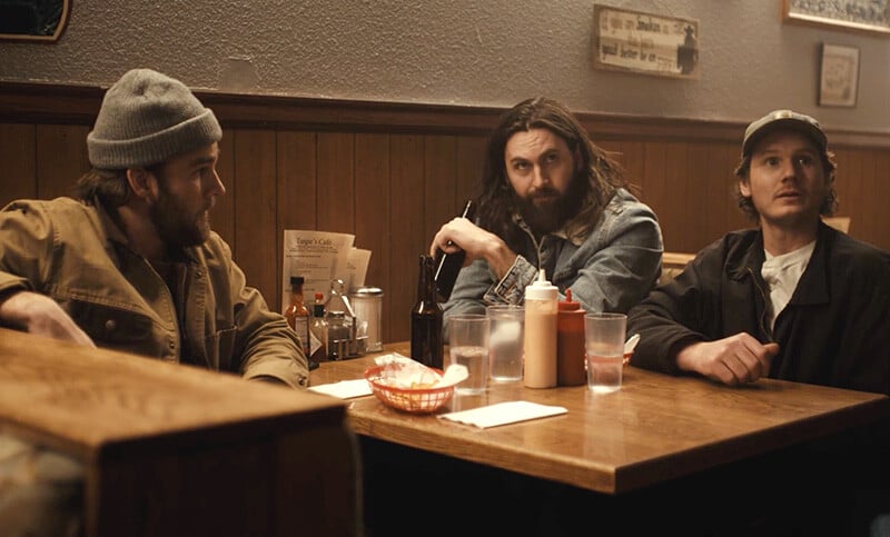 friends at dinner in a divebar